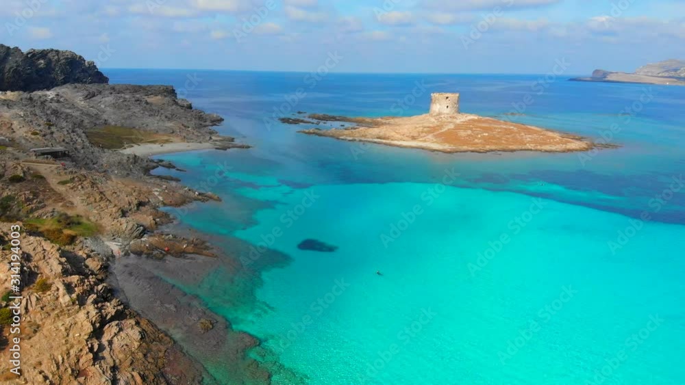 Stunning aerial view 4k drone of beautiful white sand beach bathed by a clear and turquoise sea, Sardinia, Italy. Stunning aerial view 4k drone of beautiful white sand beach bathed by a clear and turquoise sea, Sardinia, Italy.