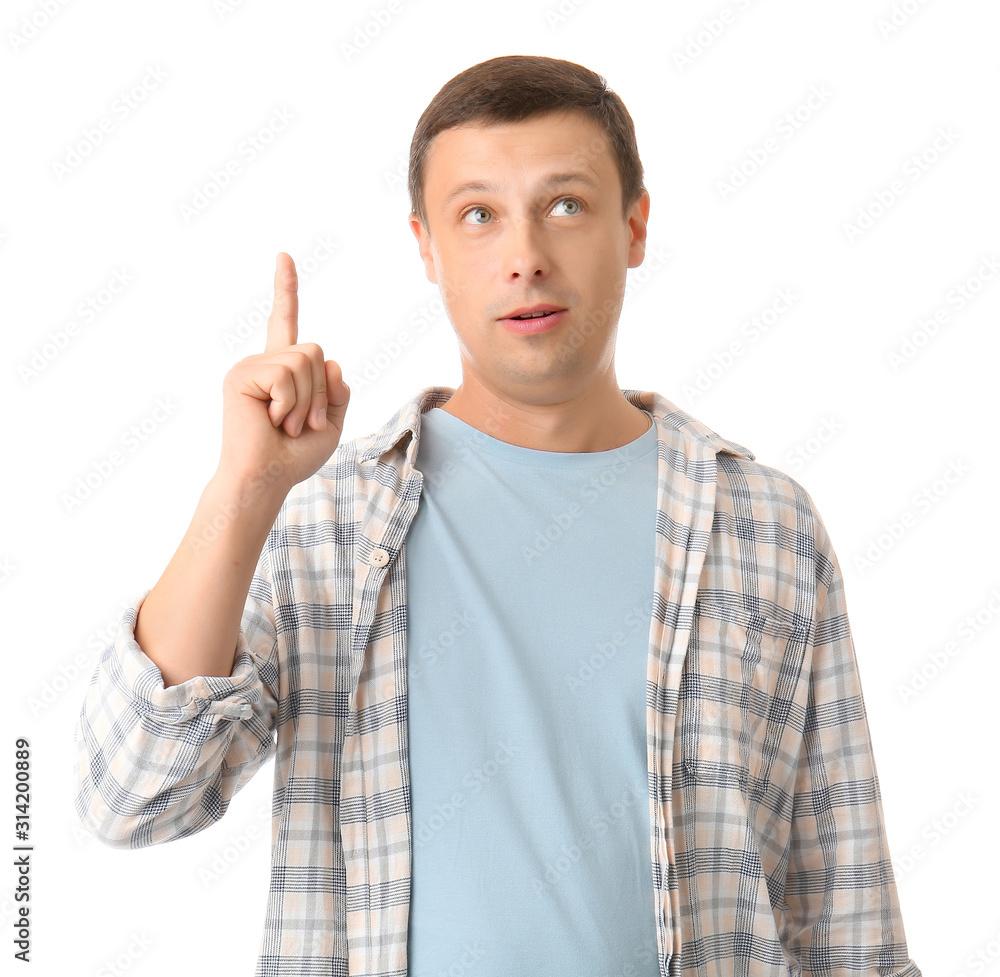 Portrait of handsome man with raised index finger on white background Portrait of handsome man with raised index finger on white background