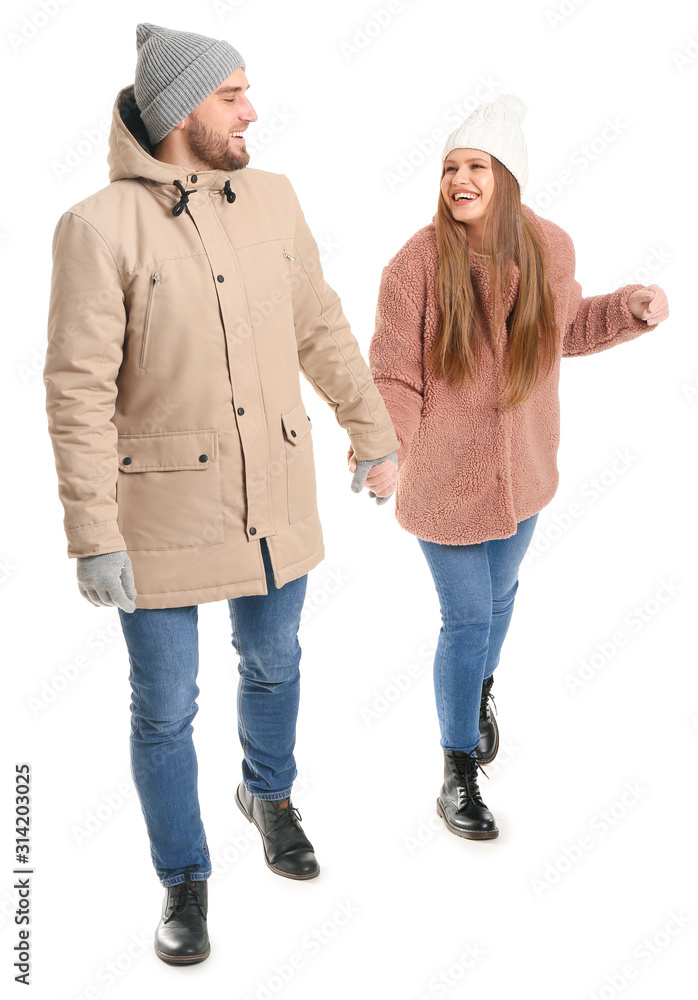 Portrait of happy couple in winter clothes on white background Portrait of happy couple in winter clothes on white background