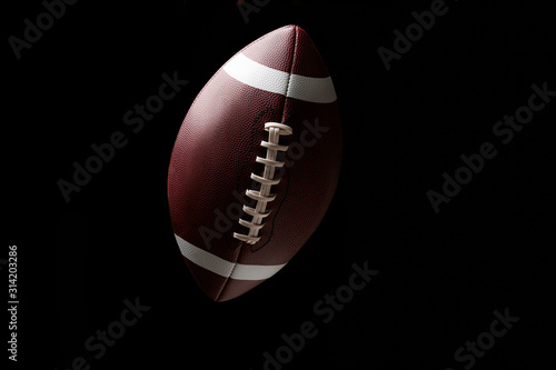 Rugby ball on dark background