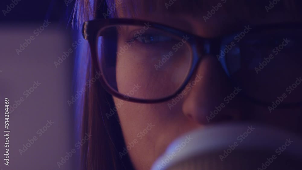 extreme close up shot, a woman with glasses scrolling on the tablet or smartphone and drinking take away coffee , screen reflecting on the glasses. extreme close up shot, a woman with glasses scrolling on the tablet or smartphone and drinking take away coffee , screen reflecting on the glasses.