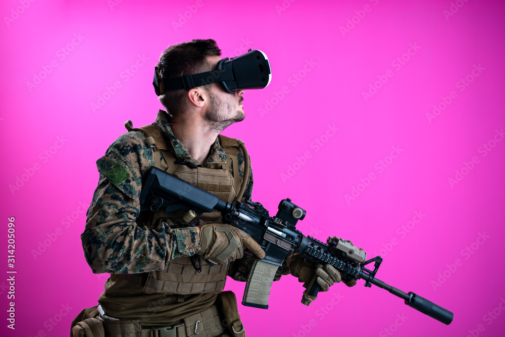 Fototapeta premium soldier in battle using virtual reality glasses