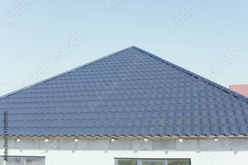 Corrugated metal roof and metal roofing. Modern roof made of met