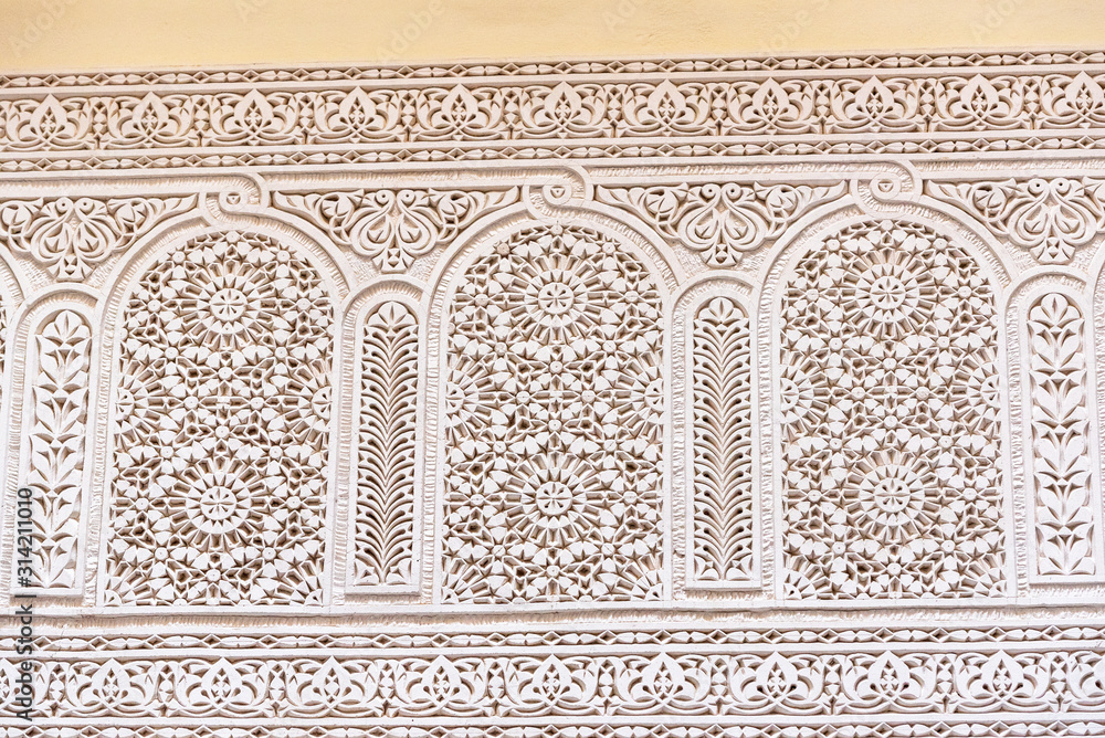Carved decorative walls in oriental style in the city of Fes, Morocco.