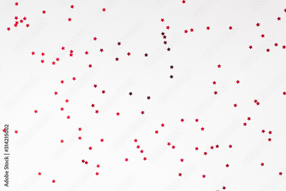 Red stars on a white background. Background of Valentine's day, Christmas or New Year