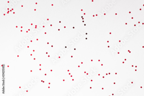 Red stars on a white background. Background of Valentine's day, Christmas or New Year