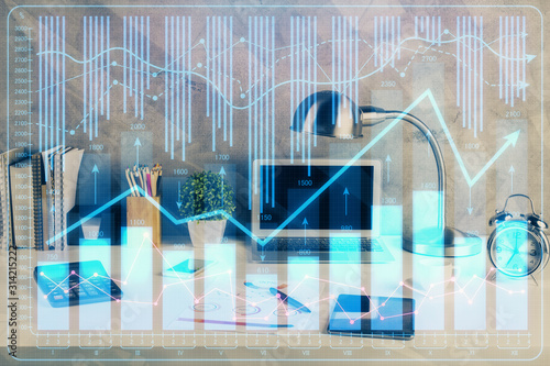 Double exposure of forex graph and work space with computer. Concept of international online trading.