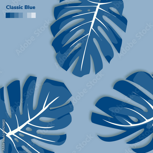Classic blue. Trendy color of the year 2020. Floral background with leves monstera.