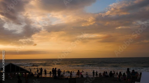 Sunset watching by the sea 4K 60FPS photo