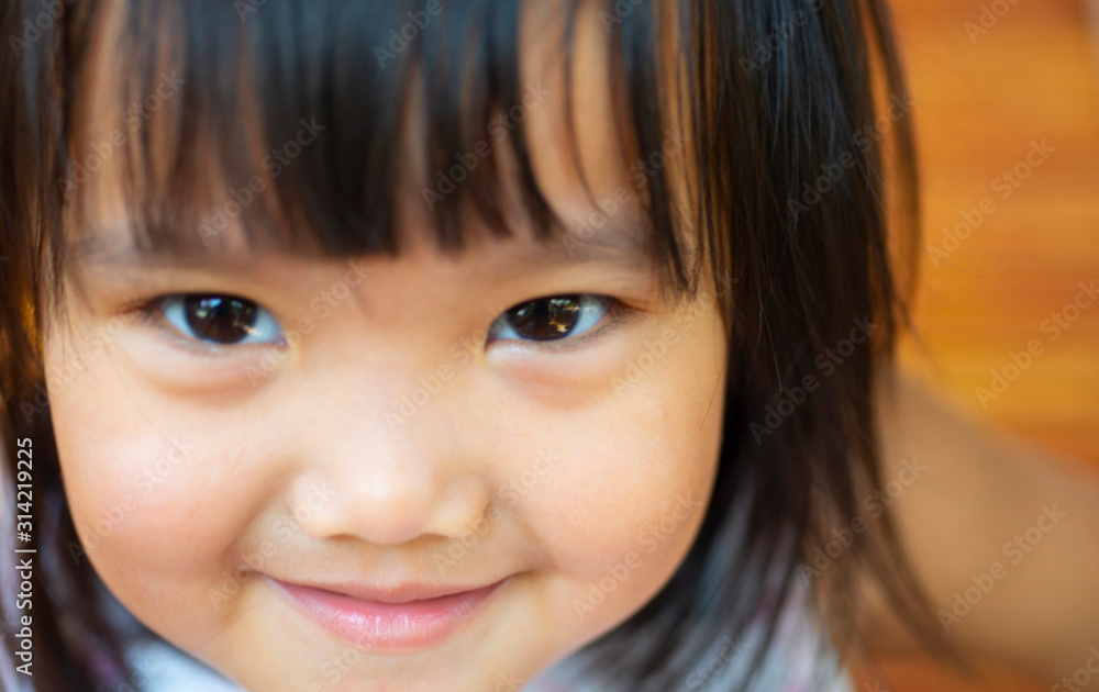 Portrait of a happy Asian girl. Portrait of a happy Asian girl.