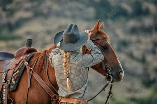Cowgirl Checking Tack