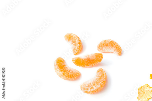 oranges peeled on the white background