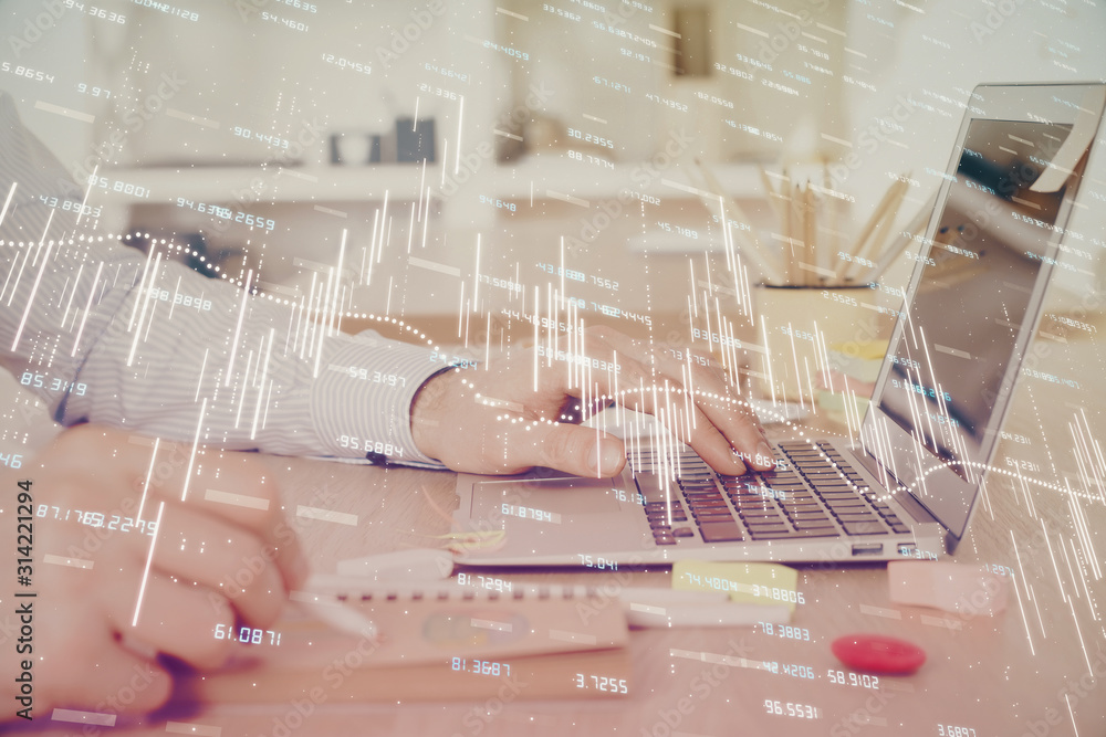 Multi exposure of stock market graph with man working on laptop on background. Concept of financial analysis. Multi exposure of stock market graph with man working on laptop on background. Concept of financial analysis.