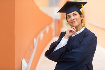 Young hispanic female graduate at her graduation