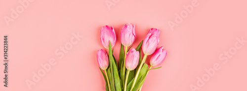 View from above tulips and gift box with copy space. Background for womens day, 8 March Valentines day, 14 february. Flat lay style, top view, mockup, template, overhead. Greeting card © Алина Бузунова