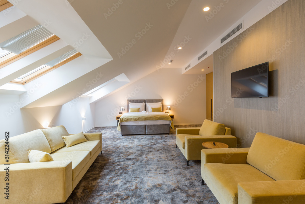 Interior of a loft double bed hotel bedroom