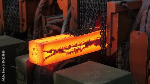 Iron foundry. Continuous casting machine. The exit of steel billets.