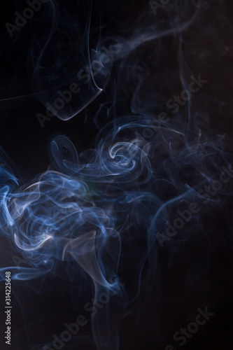 Smoke on a black background.