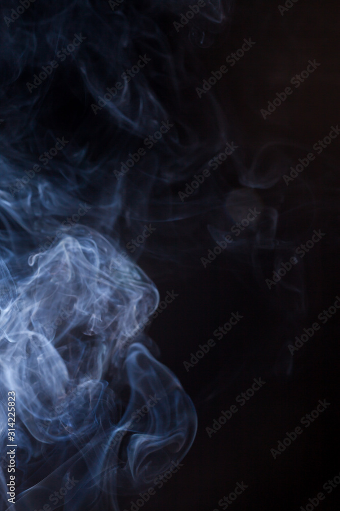 Obraz premium Smoke on a black background.