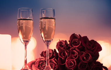 Valentine's Day, and romantic date night concept.  Champagne and roses. 
