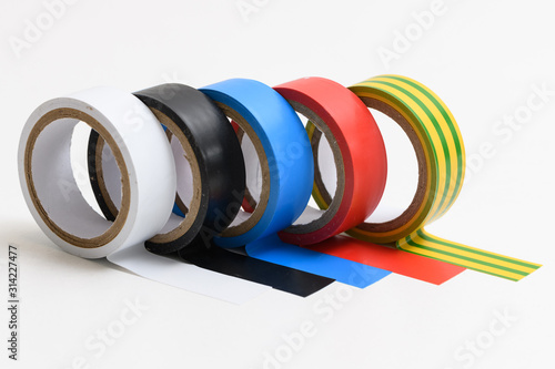 Foto different colored insulating tapes on white background
