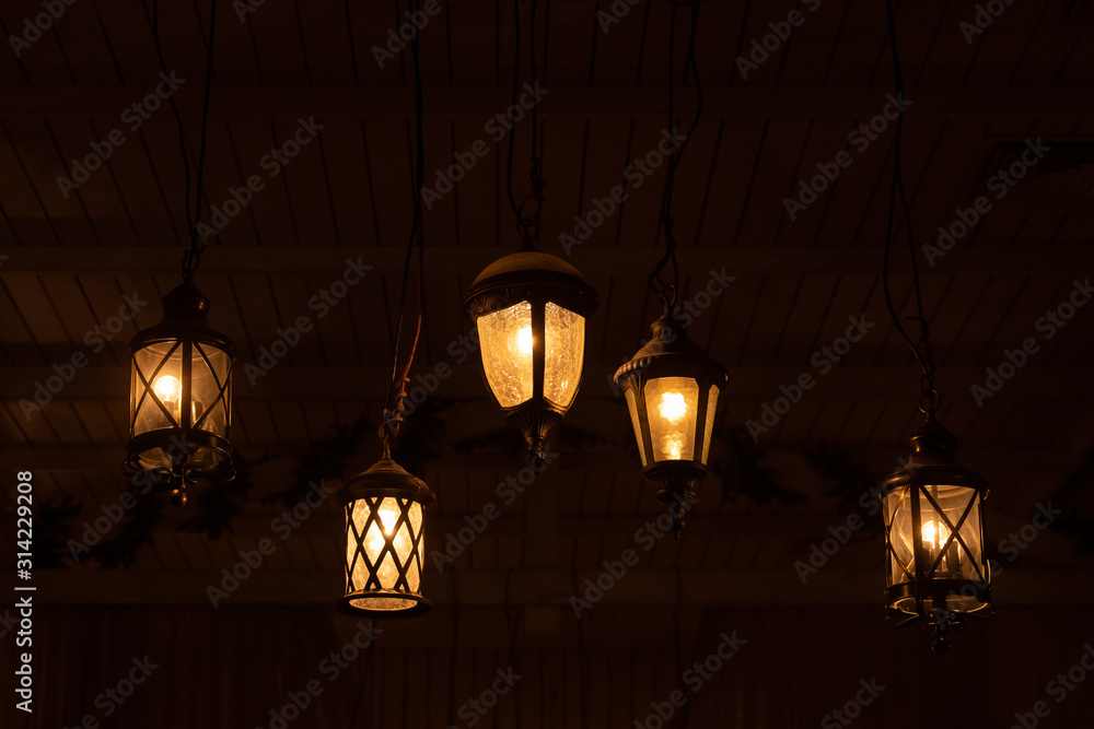 Vintage ceiling lights in the form of street lights. Lighting and interior decoration
