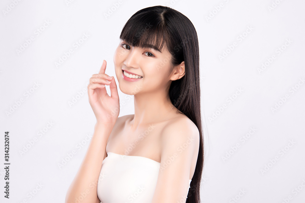Beautiful Young Asian Woman with Clean Fresh Skin. Face care, Facial treatment, on white background, Beauty and Cosmetics Concept. Beautiful Young Asian Woman with Clean Fresh Skin. Face care, Facial treatment, on white background, Beauty and Cosmetics Concept.