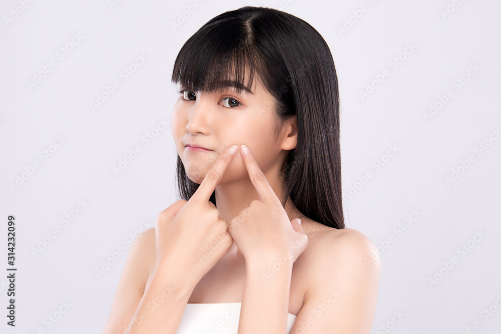 Acne treatment. Acne woman. Young woman squeezing her pimple, removing pimple from her face. Woman skin care concept. Acne spot pimple spot skincare beauty care girl pressing on skin problem face Acne treatment. Acne woman. Young woman squeezing her pimple, removing pimple from her face. Woman skin care concept. Acne spot pimple spot skincare beauty care girl pressing on skin problem face