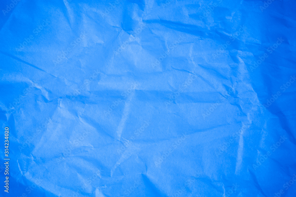 Crumpled blue paper background. Crumpled blue paper background.