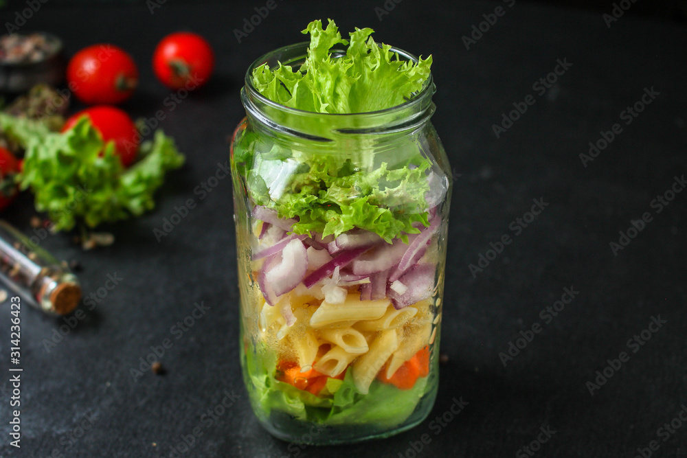 healthy salad in a jar (vegetable snack pasta salad) menu concept. food background. top view. copy space healthy salad in a jar (vegetable snack pasta salad) menu concept. food background. top view. copy space