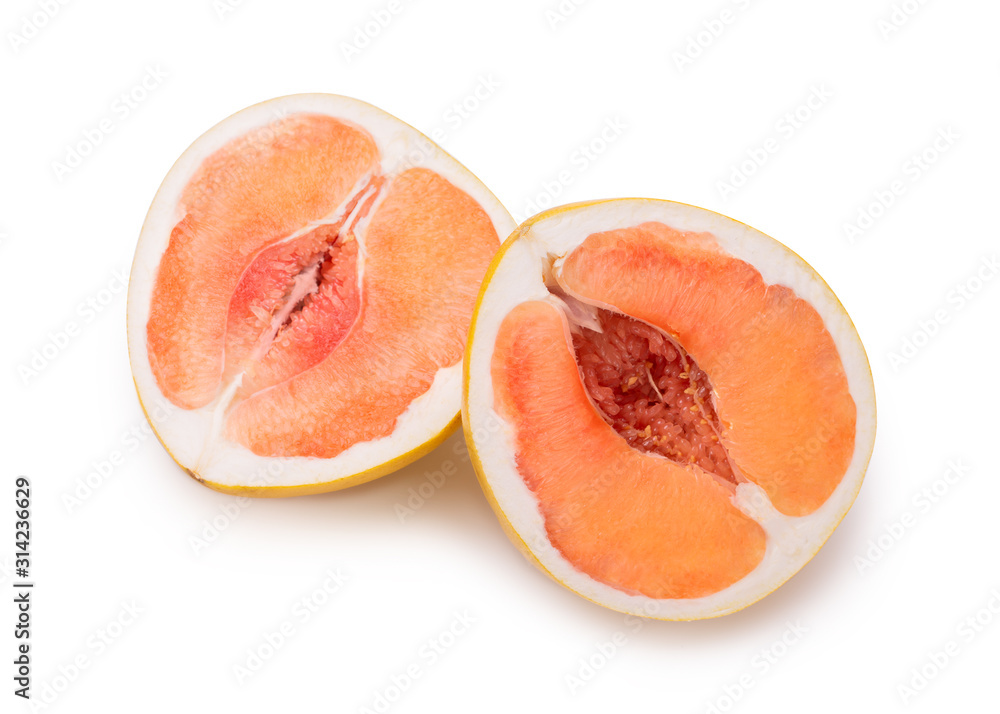 Fresh fruit pomelo close-up. Pomelo halves on a white background. Fresh fruit pomelo close-up. Pomelo halves on a white background.