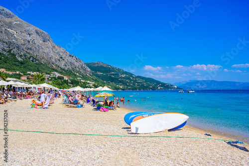 Fototapeta Naklejka Na Ścianę i Meble -  Barbati Beach with crystal clear azure water in beautiful landscape scenery - paradise coastline of Corfu island, Ionian archipelago, Greece.