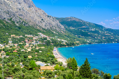 Fototapeta Naklejka Na Ścianę i Meble -  Barbati Beach with crystal clear azure water in beautiful landscape scenery - paradise coastline of Corfu island, Ionian archipelago, Greece.