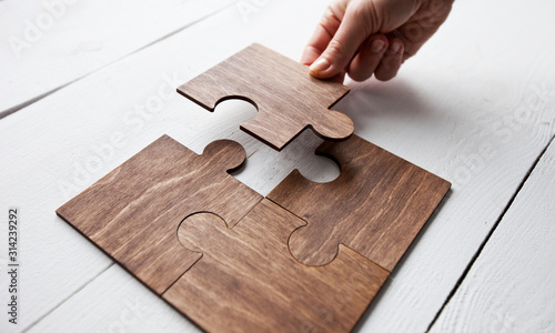 Εκτύπωση καμβά The woman hand connecting puzzles to each other