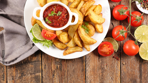 fried potato and tomato sauce- top view