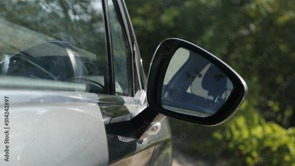 Unlocking car with robotic wing mirror moving 4K video Unlocking car with robotic wing mirror moving 4K video