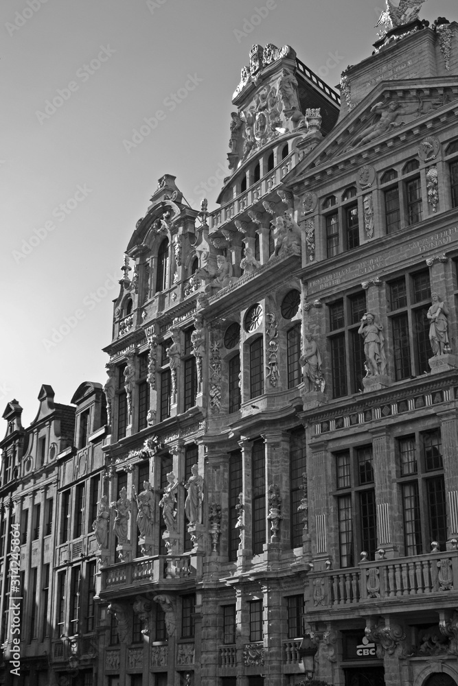Brussels, Belgium - October 13th 2017 : Focus on two beautiful facades of the Grand-Place, of the building Le Renard (the fox, on left) and le Cornet (the horn, on right)