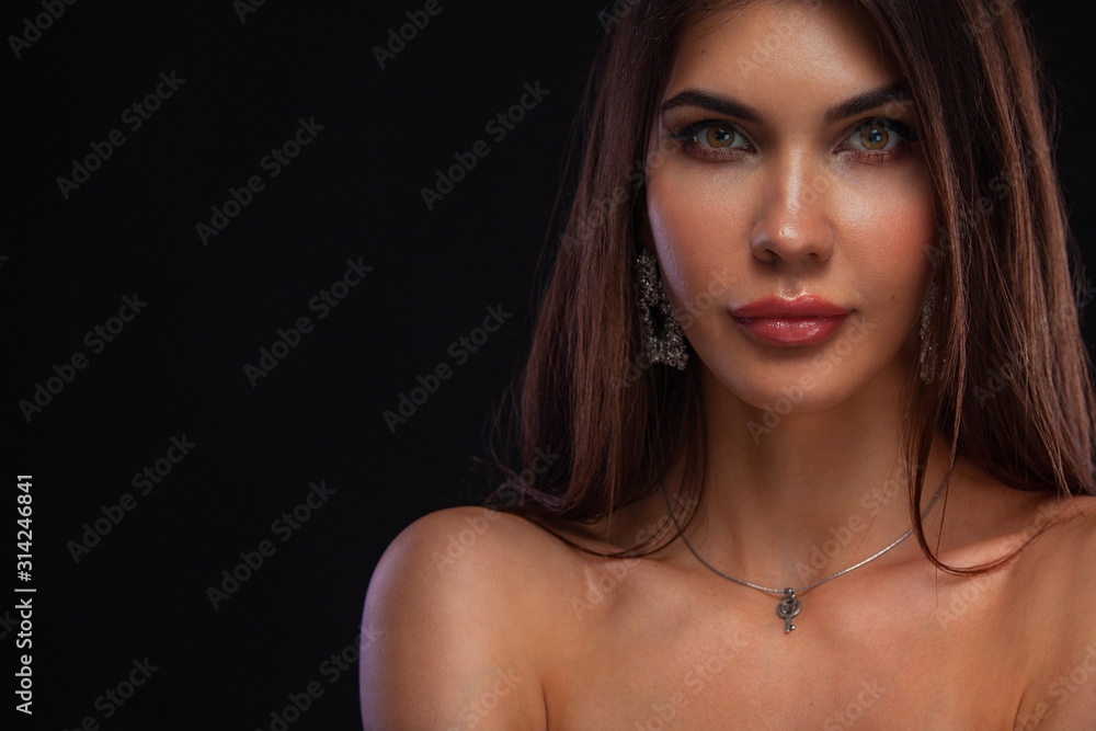 Closeup portrait of beautiful young woman with clean and fresh skin. Nude makeup. Concept for cosmetology ads with copy space, beauty magazine and spa.