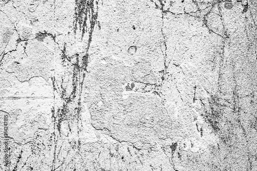 Texture of a concrete wall with cracks and scratches which can be used as a background