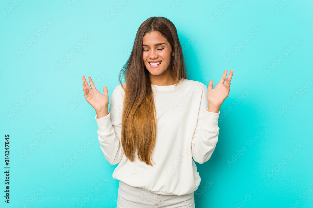 Young slim woman joyful laughing a lot. Happiness concept. Young slim woman joyful laughing a lot. Happiness concept.