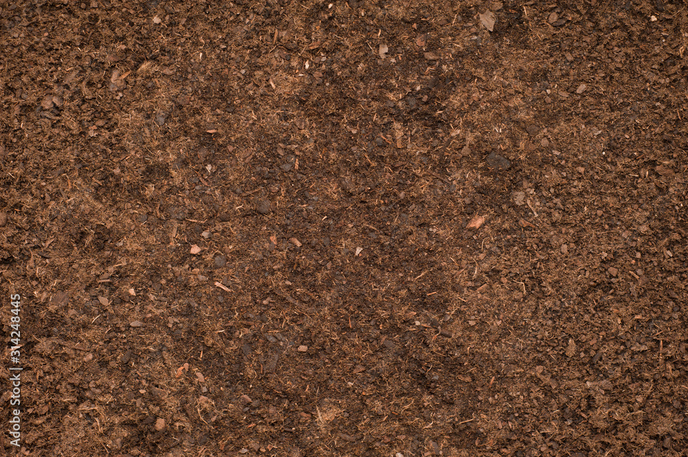 Textured fertile soil as background. Gardening season Textured fertile soil as background. Gardening season