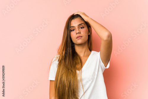 Young caucasian woman doing beauty poses isolated