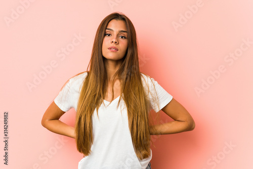 Young caucasian woman doing beauty poses isolated