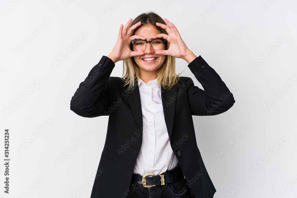 Young business caucasian woman showing okay sign over eyes Young business caucasian woman showing okay sign over eyes