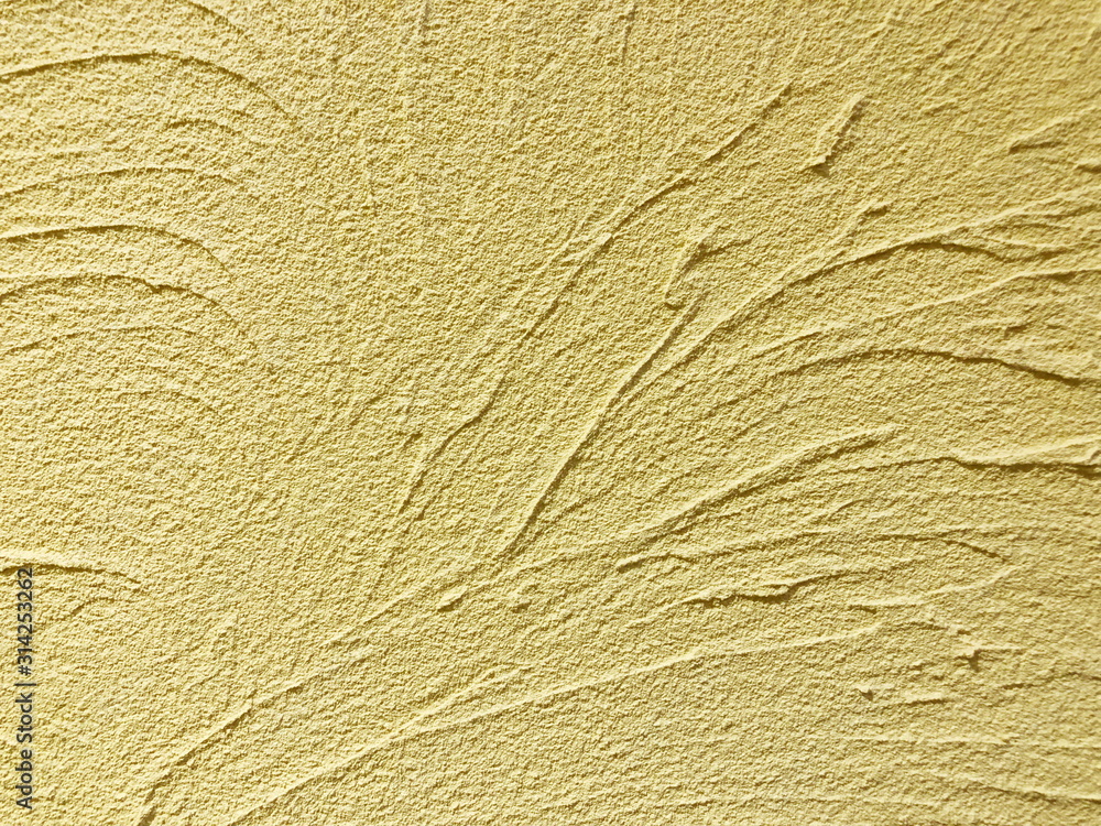 Decorative yellow cement wall background Decorative yellow cement wall background