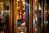 Christmas decoration at the window of a classic saloon ship