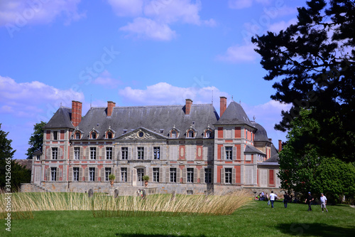 Courson-Monteloup, France - May 17th 2014 : View of the castle, in Renaissance style. Twice a year, a flowers exhibition is organized in the gardens of the castle.