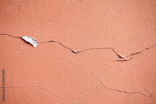 Textured background. Decorative plaster walls. Color with cracks and peeling