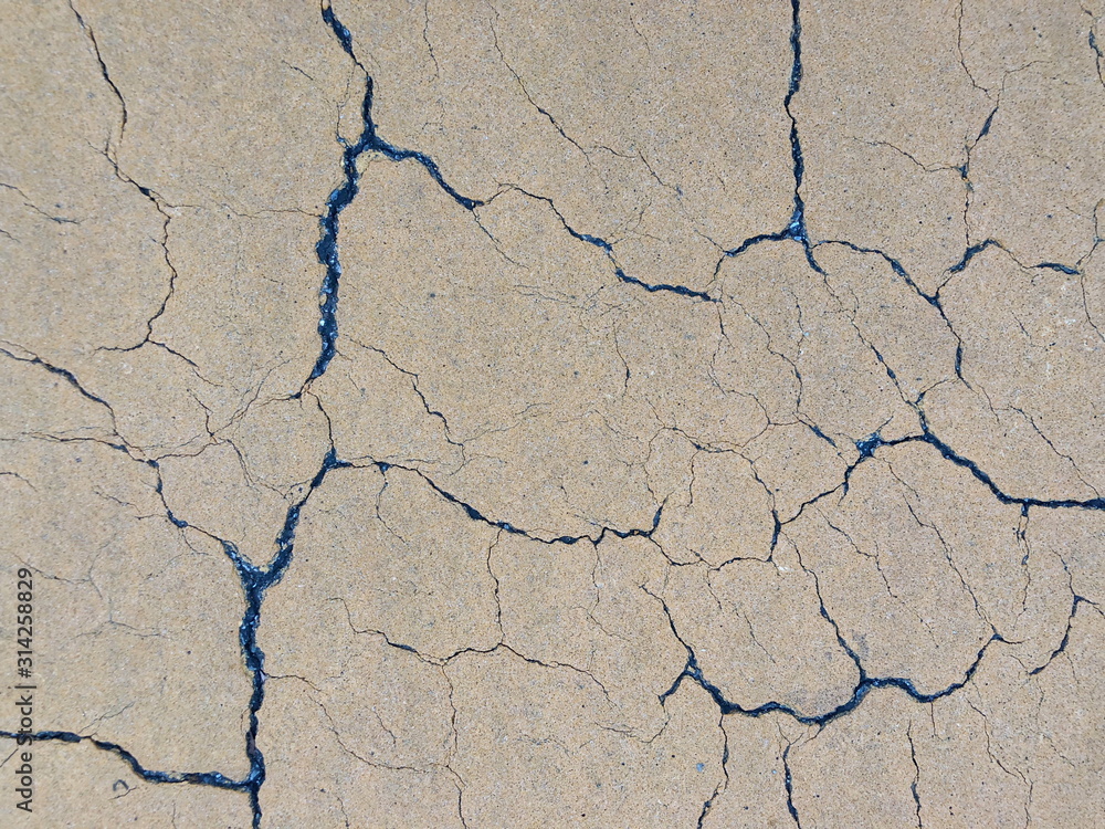 Fototapeta premium Close up Cracked concrete floor background.