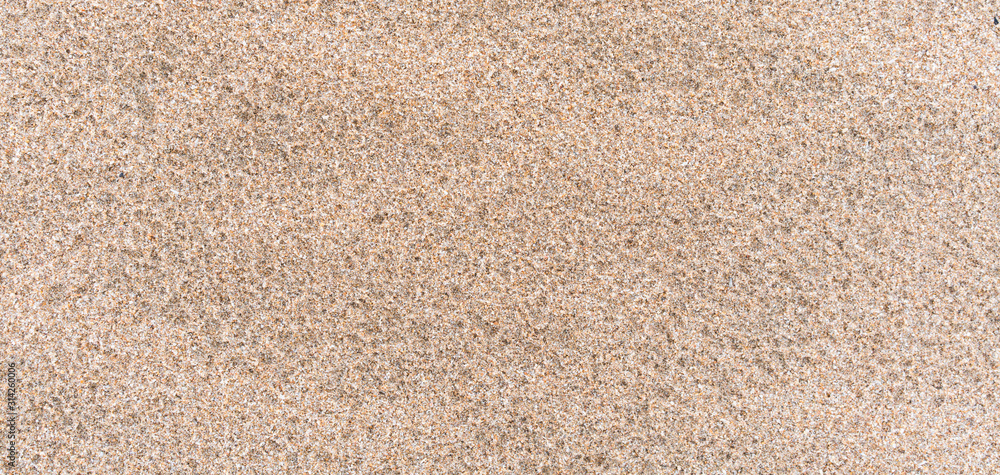 Sand Texture. Brown sand. Background from fine sand Sand Texture. Brown sand. Background from fine sand